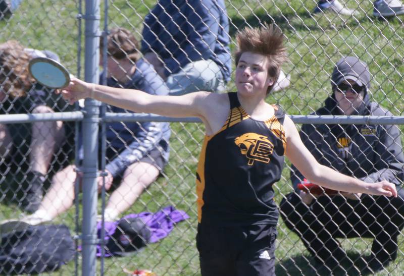 Putnam County's Mavrick Holocker throws discus during the Rollie Morris Invite on Saturday, April 16, 2022 at Hall High School in Spring Valley.
