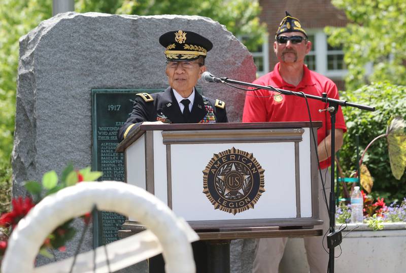 Major General James H. Mukoyama, Jr., keynote speaker, addresses the crowd Monday, May 29, 2023, at Memorial Park during the Wauconda Memorial Day Ceremony. Past Commander Ryan Jacobsen stood close by.