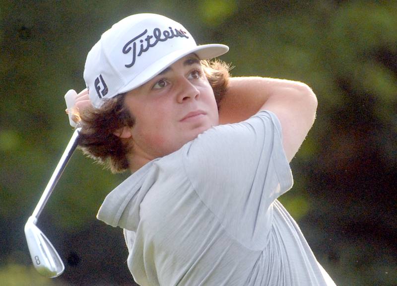 Minooka's Carter Stephenson watches his tee shot on the 4th hole during the Southwest Prairie Conference boys golf meet at Blackberry Oaks Golf Course in Bristol on Wednesday, Sept. 20, 2023.