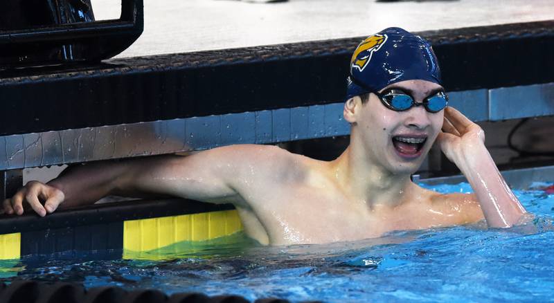 Neuqua Valley’s Alex Parkinson views his time of 4:22.33 after winning the 500-yard freestyle during the boys state swimming and diving finals at FMC Natatorium on Saturday, Feb. 24, 2024 in Westmont.