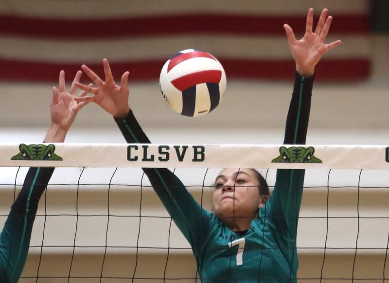 Woodstock North’s Chloe Soto-Garcia blocks against Prairie Ridge in IHSA Class 3A Sectional semifinal volleyball action on Tuesday, Nov. 5, 2024, at  Crystal Lake South High School  in Crystal Lake.