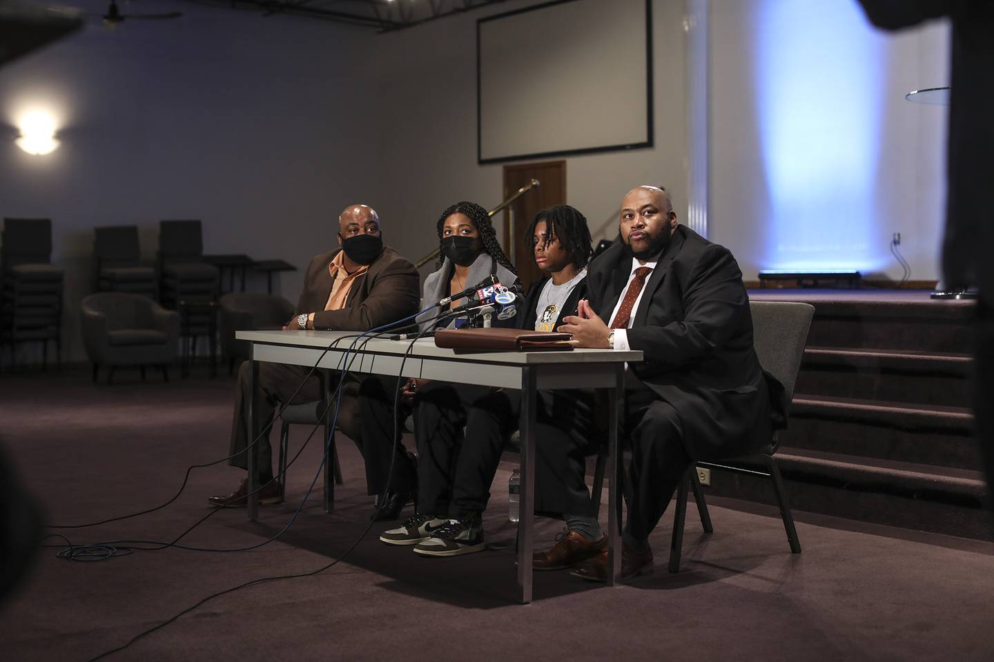 Jazzpher Evans (center right), her family, and local attorney Keenan Saulter (right) take questions from reporters on Thursday, April 8, 2021, at One Vision Worship Center in Joliet, Ill. Evans, a current Quincy University student and Joliet West High School graduate was allegedly assaulted in a racially motivated attack on Sunday night at a local Quincy bar.