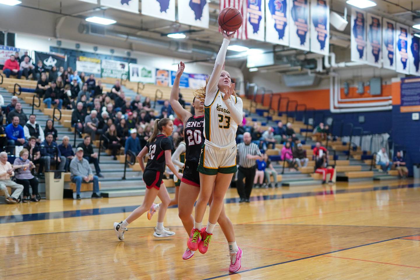 Waubonsie Valley's Lily Newton (23) shoots the ball in the post against Benet’s Emma Briggs (20) during a Class 4A Oswego Sectional final basketball game at Oswego High School on Thursday, Feb 22, 2024.