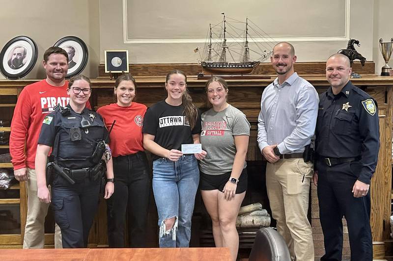 Ottawa PB&PA members are pictured with members of the Ottawa High School softball program.