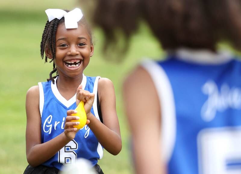 Joseline Griffey, 7, from DeKalb, looks to hit her brother Jaice with a water balloon during the Juneteenth Community Celebration Saturday, June 15, 2024, at Hopkins Park in DeKalb.