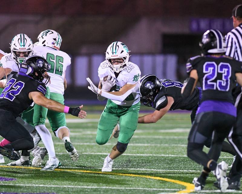 York's Henry Duda (26) gains some yards during the game on Friday Oct. 10, 2025, while traveling to take on Downers G