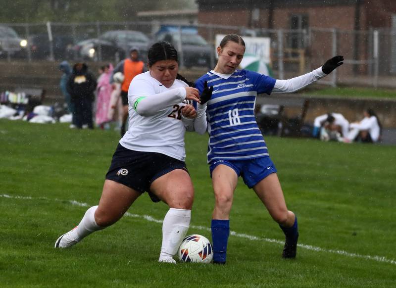 Sterling's Michelle Diaz and Princeton's Ruby Acker battle for the ball Thursday at Bryant Field. The Tigresses won 3-1.