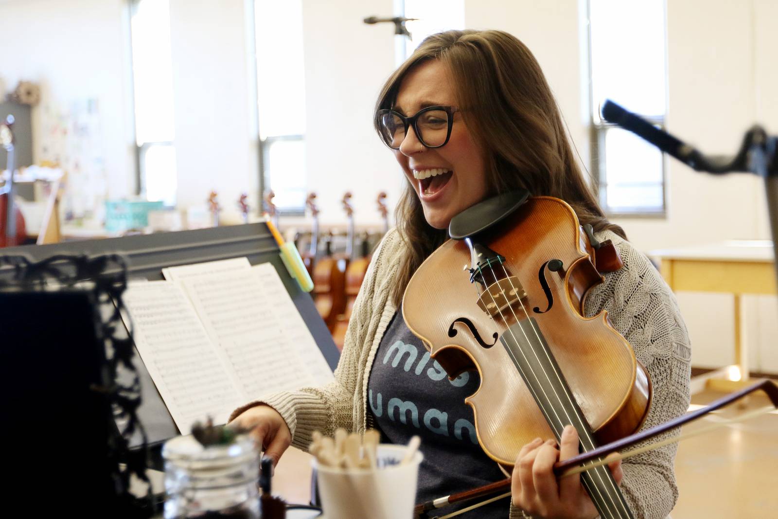 Woodstock orchestra teacher leads class over Zoom Shaw Local