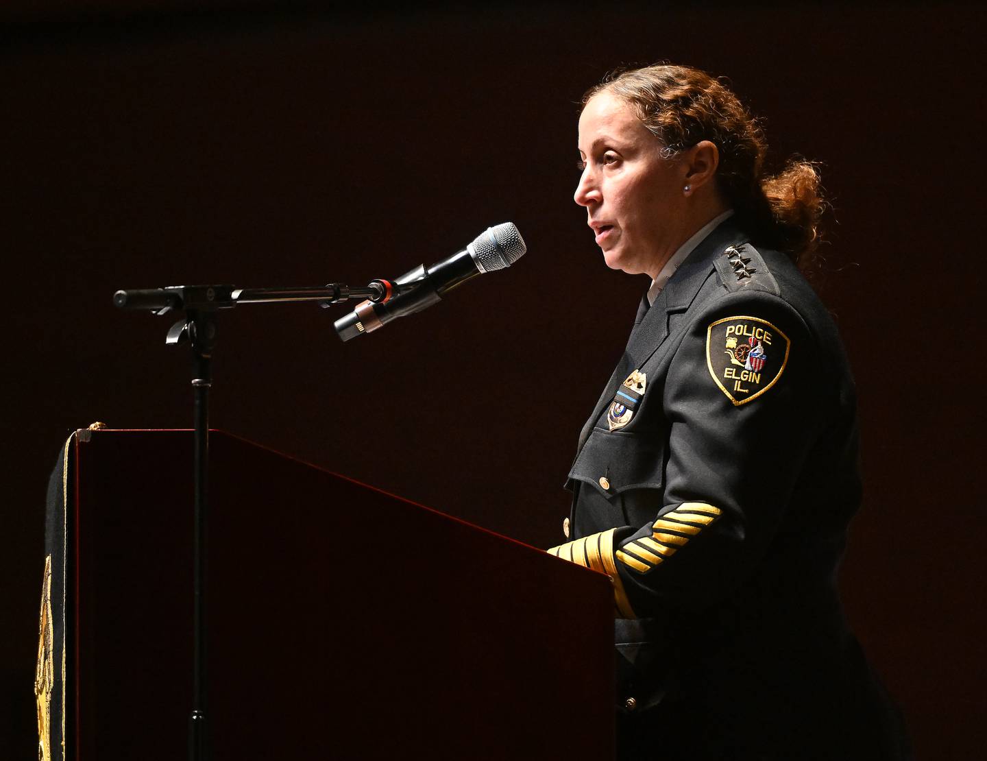 Elgin Police Chief Ana Lalley speaks during the departments annual memorial service at the Hemmens Cultural Center Thursday.