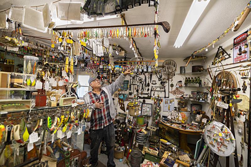 Lyle Reap of Polo points out one of thousands of fishing lures he has on display at his home in Polo Thursday, Dec. 7, 2023.