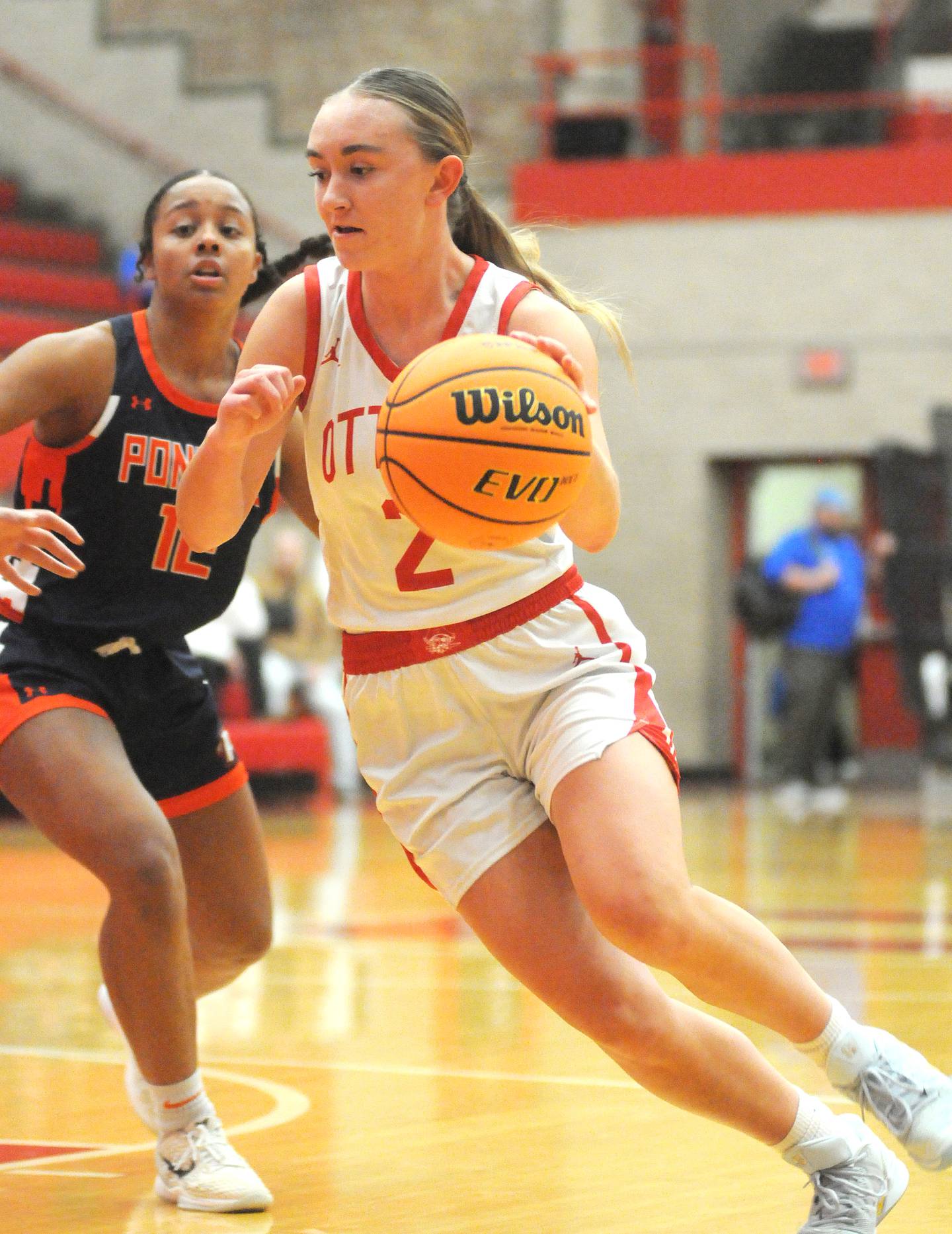 Ottawa's Ashlynn Ganiere (2) drives past a Pontiac defender on her way to the basket in the Ottawa Girls Holiday Tournament third place game on Tuesday, Dec. 23, 2025 in Kingman Gymnasium.