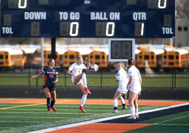 Lyons Township's Grace Chevalier kicks the ball during a game against Naperville North on Wednesday, April 16, 2025 in Naperville.