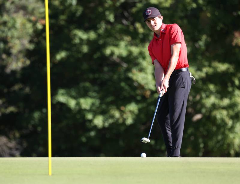 Ottawa’s Chandler Creedon putts on the third hole Monday, Sept. 23, 2024, during the Interstate 8 boys golf tournament at the Kishwaukee Country Club in DeKalb.