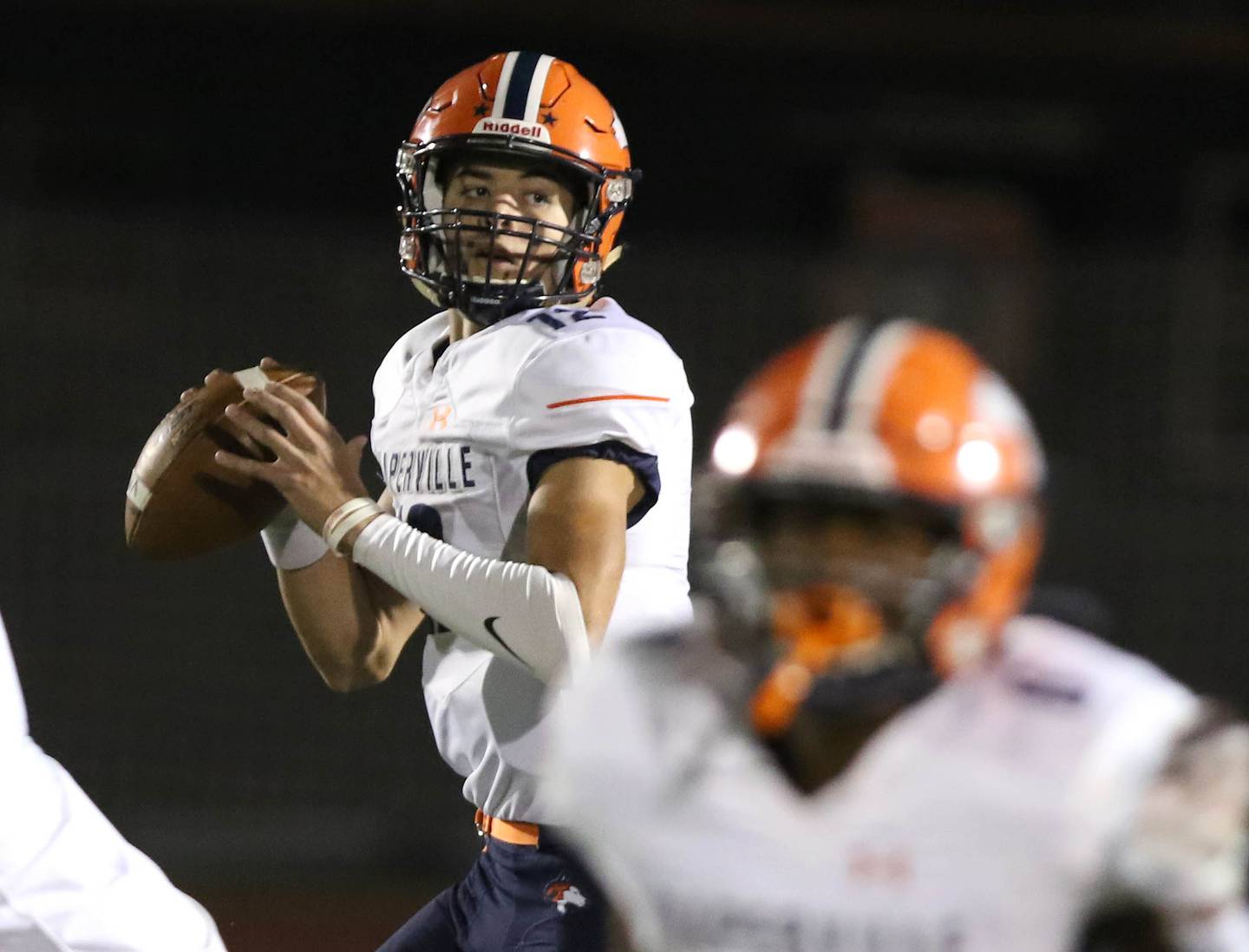 Naperville North quarterback Aidan Gray looks for a receiver during their game Friday Sep. 25, 2021 at DeKalb High School.