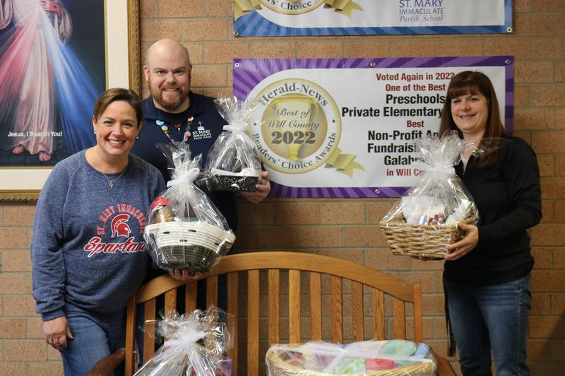 A variety of live and silent auctions will be part of the St. Mary Immaculate Parish School's Galabration "Boots and Bling" event on Feb. 11.  Showing off some of the basket items are Karen Klump, assistant principal and second grade teacher; Christopher Hueg, eighth grade teacher and Galabration co-coordinator; and Jennifer Errthum, principal.