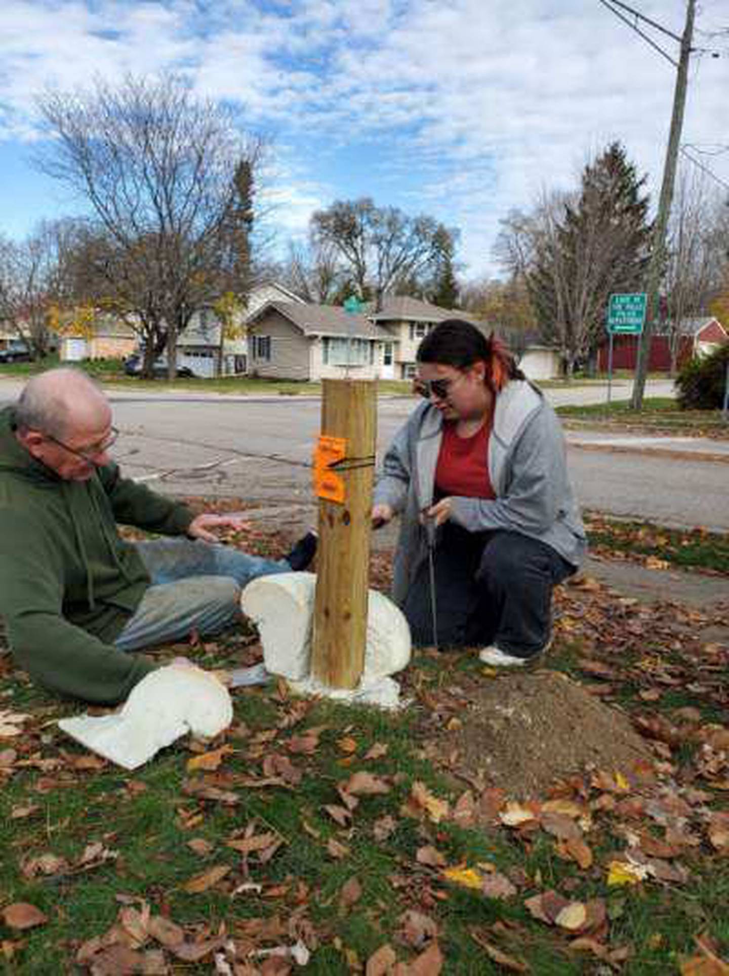 Shirley Stockwell installing Little Free Library in Lake in the Hills.