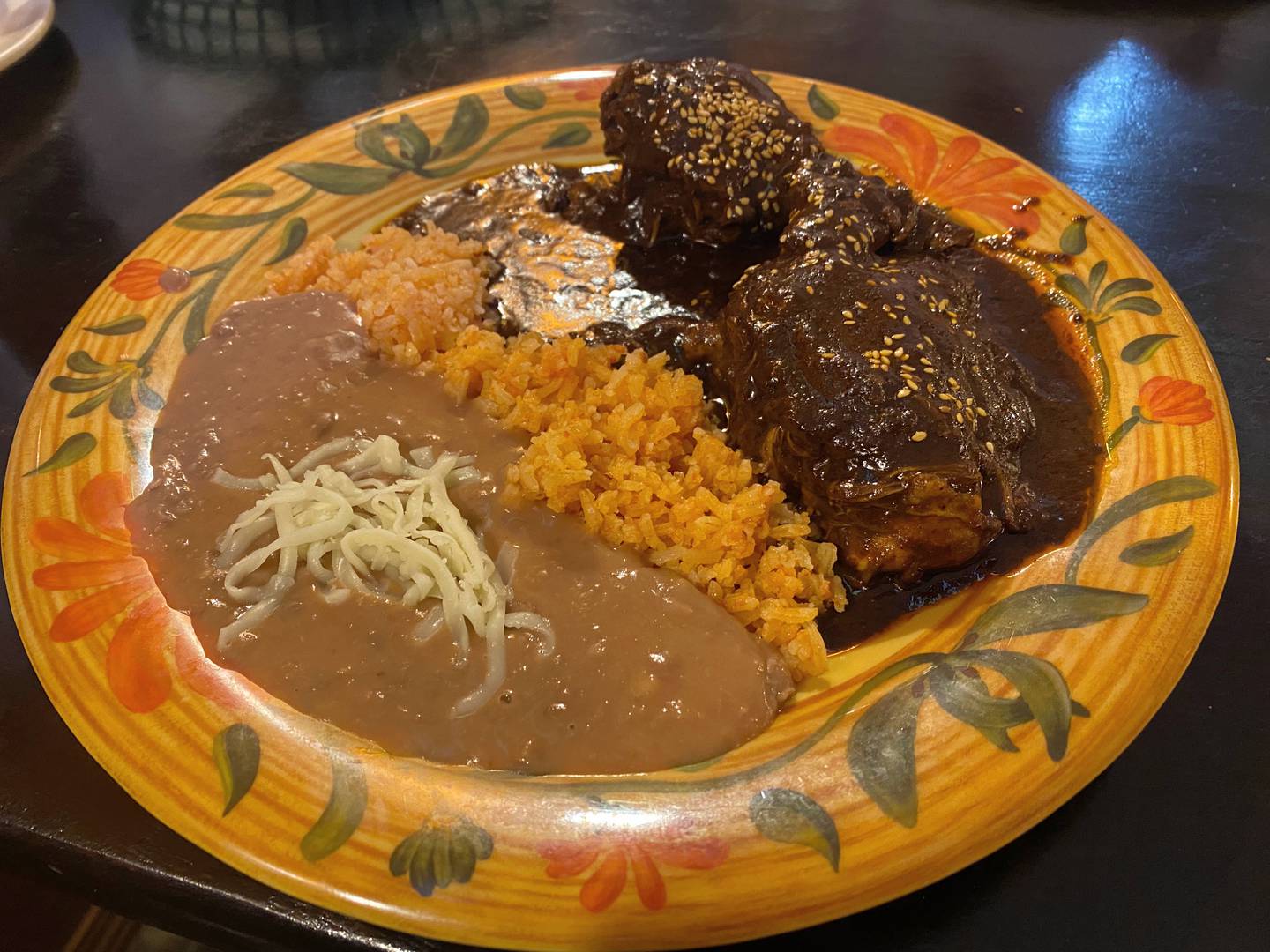 My fellow diner order the mole poblano ($15.99), which was a chicken breast with mole sauce, at Taqueria Las Cumbres in Crystal Lake.