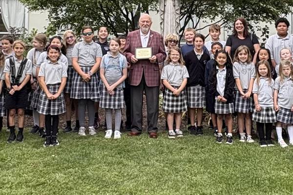 Sycamore Catholic school honors former employee