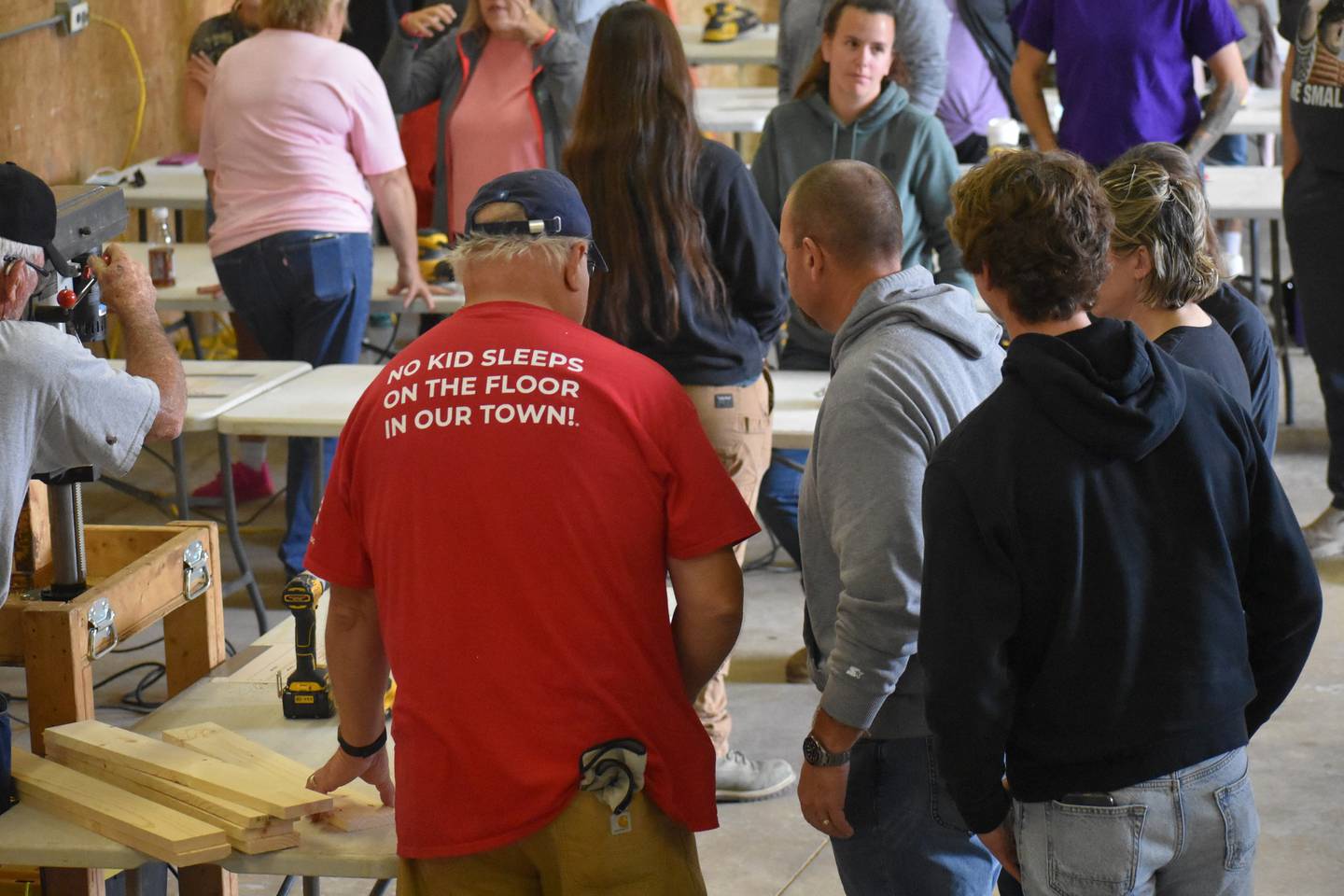 Volunteers help build beds during the Kankakee Area Sleep in Heavenly Peace build day on Oct. 18, 2025.