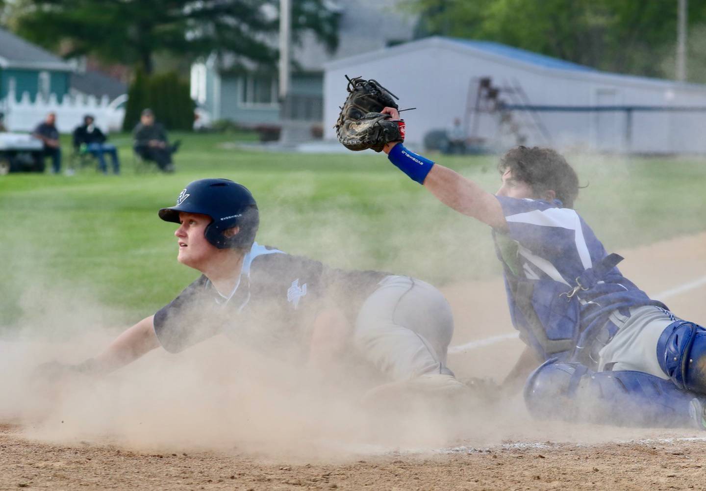 Princeton catcher Ace Christiansen tags out Bureau Valley's Elijah Endress in the fourth inning of Monday's game at Prather Field.  The Storm rallied from 9-7 with six runs in the seventh inning.