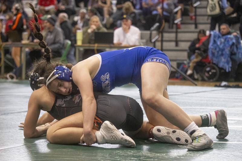 Isabella Gibson of Princeton High School defeats Dru Hyde of Macomb High School in the 140 weight division of girls wrestling sectionals at Geneseo High School on February 10, 2024. Gibson would later place forth in sectionals overall.