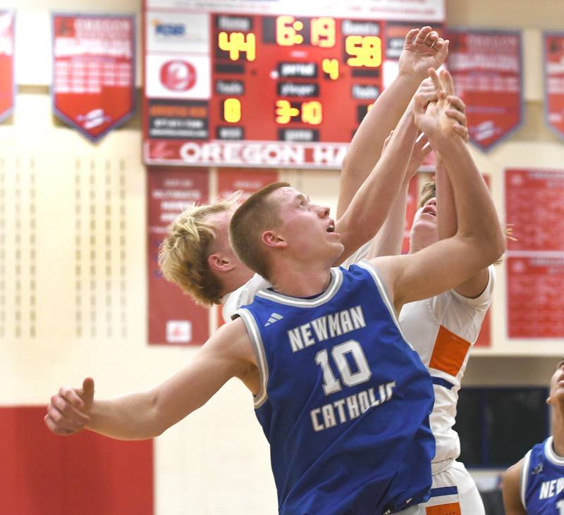 Sterling Newman's George Jumgerman battles for a rebound against Genoa-Kingston at the Oregon Boys Basketball Thanksgiving Tournament on Wednesday, Nov. 26, 2025 at Oregon High School.