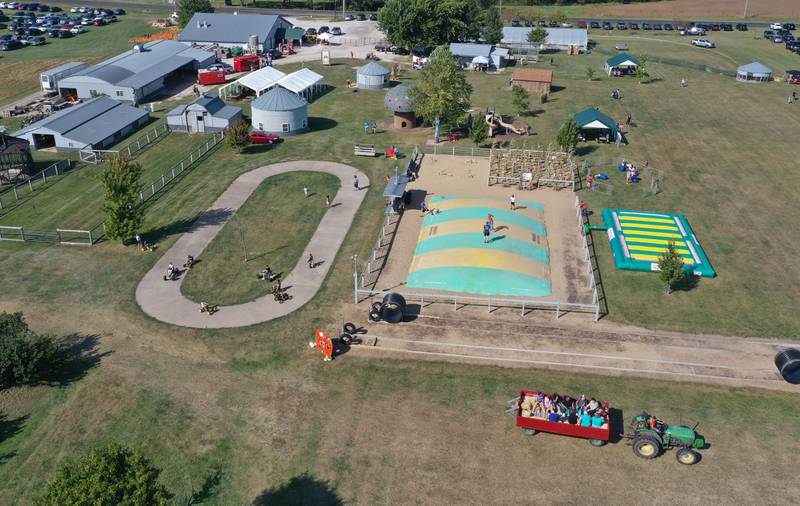 An aerial view of the play area at Boggios Orchard and Produce on Saturday, Sept. 27, 2025 in Granville. This weekend featured the 26th Annual Pumpkin Harvest Craft Show. Boggio's features a market, bakery, and pumpkin hill free of charge. There is a cost to take the kids to the play area which includes a jumping pillow, corn maze, wagon rides, a petting zoo, and playground.