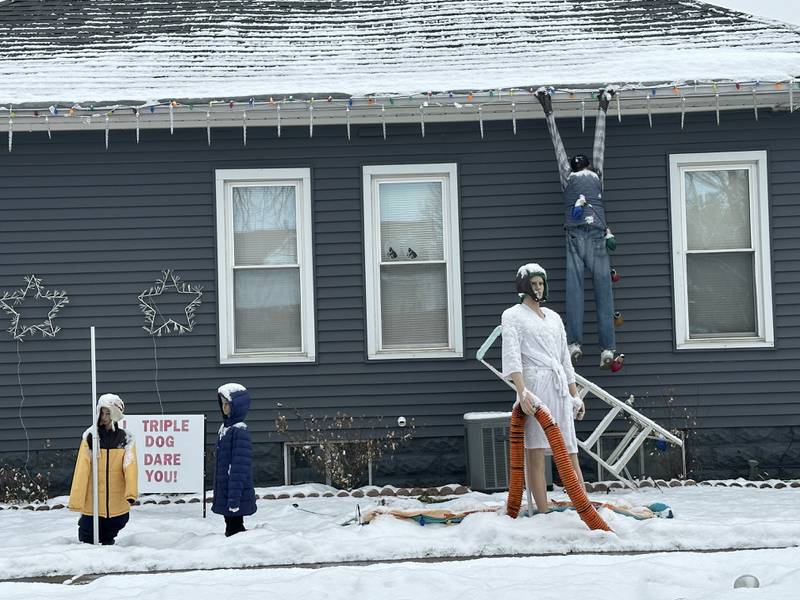 A view of a humorous Christmas Light display in the 300 block of West Walnut Street on Friday, Dec. 14, 2025 Oglesby