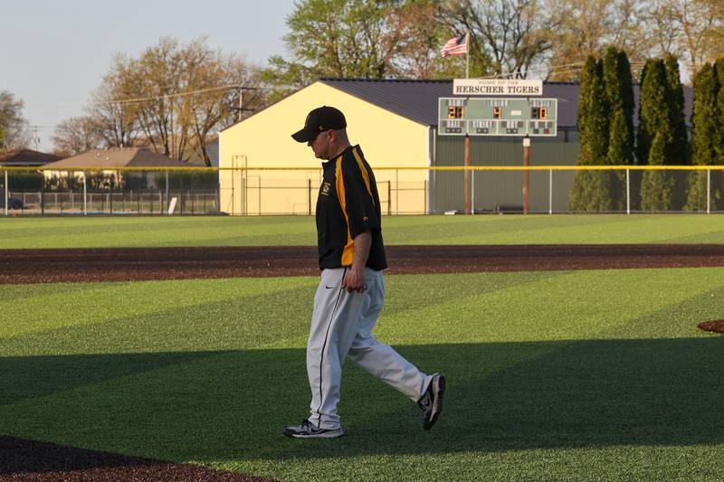 Herscher head coach Eric Regez leaves the field following his 800th career win after the Tigers earned a 21-0 victory over Grant Park on Wednesday, April 23, 2025.