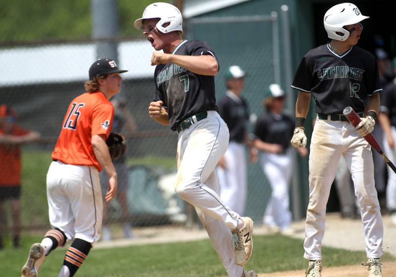 Glenbard West’s Jack Desmond (7) celebrates a run during the Class 4A Glenbard West Regional final against St. Charles East in Glen Ellyn on Saturday, May 28, 2022.