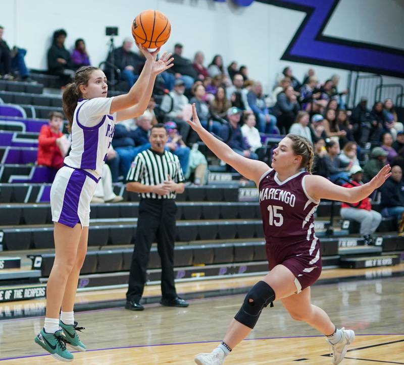 Plano's Josie Larson (23) shoots a jumper against Marengo’s Emilie polizzi (15) during a basketball game at Plano High School on Wednesday, January 29, 2025.