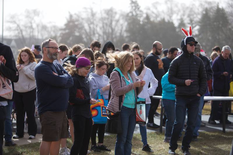 Egg hunters gather for the raffle at the Adult Easter Egg Hunt on Saturday, March 15, 2025 at Berens Park in Elmhurst.