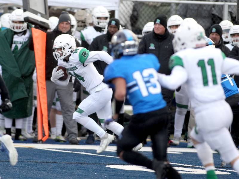 Providence’s Alex Gibson (14) runs the ball up the sideline during their Class 4A semifinal game against St. Francis in Wheaton on Friday, Nov. 19. 2022.