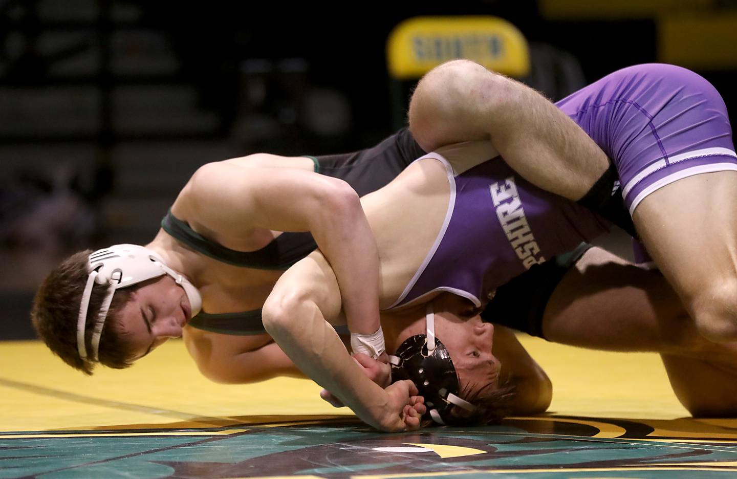 Crystal Lake South’s Aiden Marrello controls Hampshire’s John Janicki during the 165-pound match of a Fox Valley Conference wrestling meet on Thursday, Jan. 15, 2026, at Crystal Lake South High School.