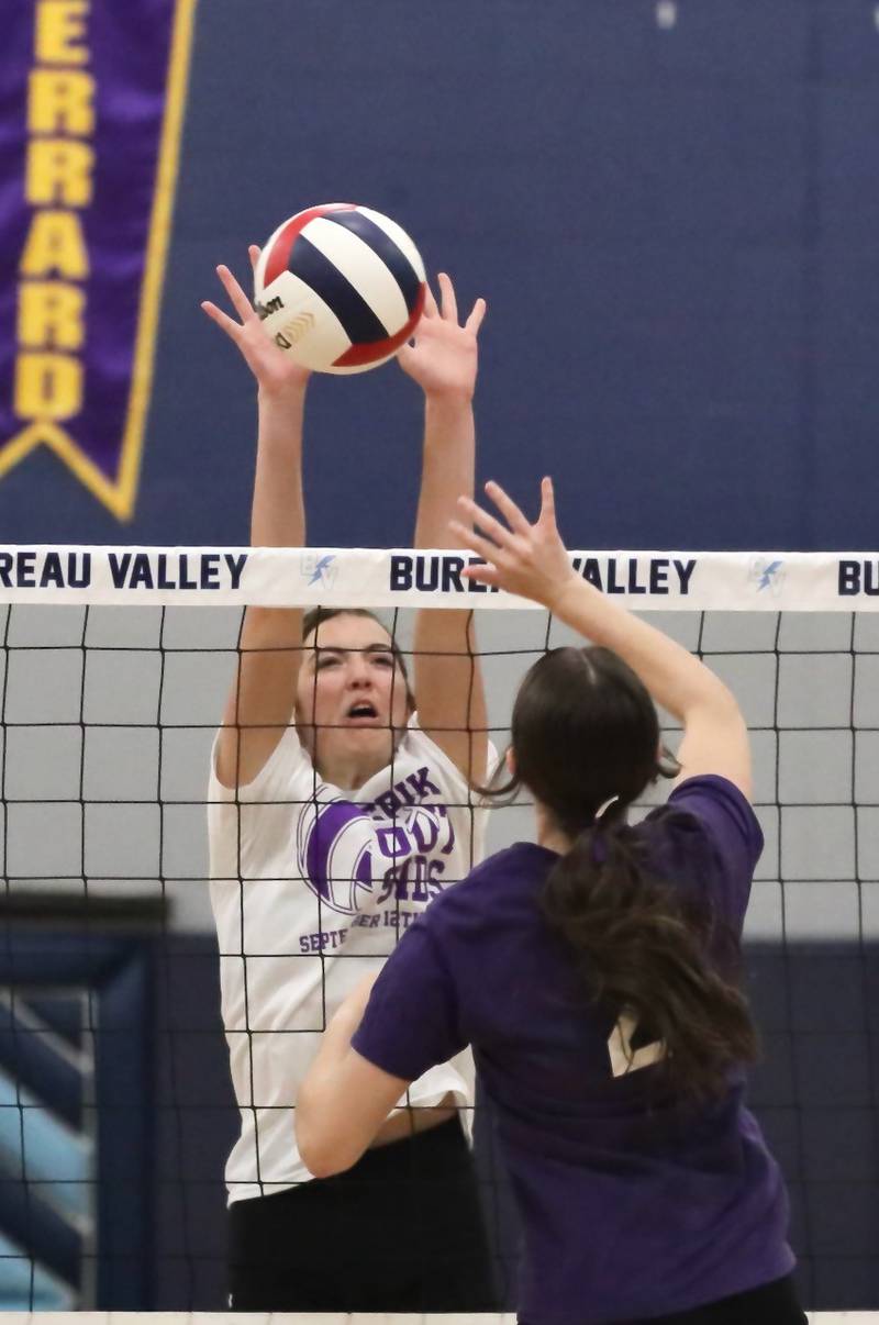 Princeton's Chrissy Sierens defends the net Tuesday night at the Storm Cellar.