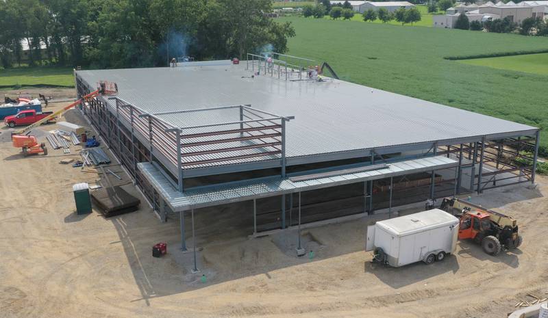 Crews continue to construct an Aldi grocery store on Tuesday, Aug. 13, 2025 at the intersection of Backbone Road and North Main Street in Princeton. Workers are beginning to build the exterior walls this week. The 20,000 square-foot store could be open by Thanksgiving.