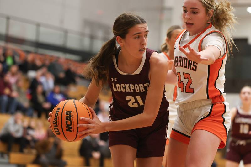 Lockport’s Katie Peetz works under the basket against Lincoln-Way West on Tuesday, Feb. 3, 2026 in New Lenox.