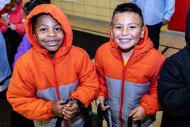 Photos: Nicor and Operation Warm distribute free coats to Joliet's Culbertson School students
