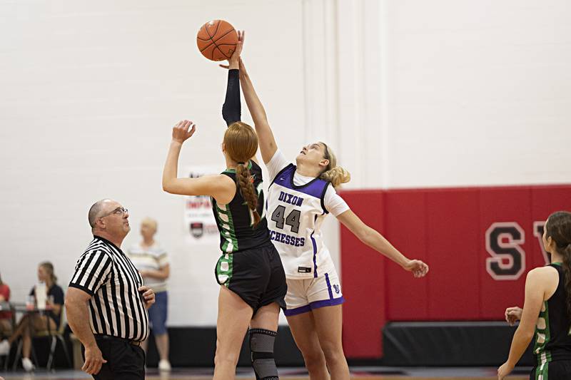 Dixon’s Ella Govig and Rock Falls’ Emily Lego start the game with a jump ball Thursday, June 15, 2023 during the Sauk Valley Media All-Star Basketball Classic at Sauk Valley College.