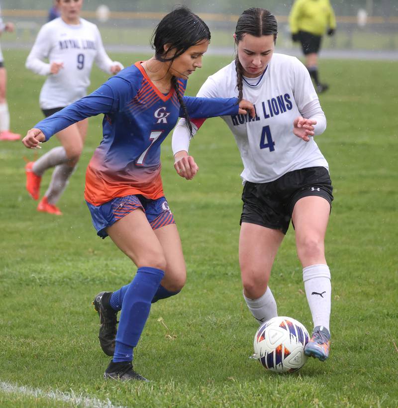 Genoa-Kingston's Jaida Modesto (left) and Rockford Christian's Emily Meyers battle for possession Tuesday, May 20, 2025, during their Class 2A regional final game at Rockford Christian High School.