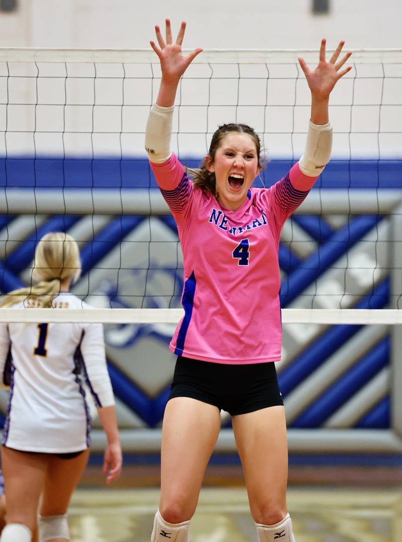Newman sophomore Ruby Burger celebrates a Comets point in Tuesday's regional semifinal match at Princeton. The Comets upset No. 2 Sherrard in three sets.