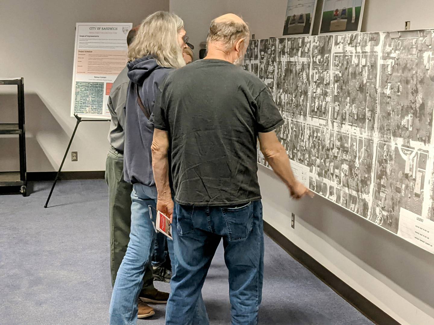 Residents attend a pre-construction open house on May 22 for the North Main Street reconstruction project in Sandwich.