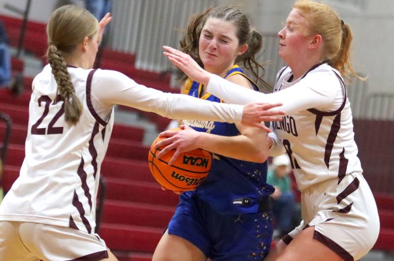 Johnsburg’s Summer Toussaint navigates heavy traffic in varsity girls basketball on Tuesday, Jan. 6, 2026 at Homer “Bill” Barry Gymnasium on the campus of Marengo High School in Marengo.
