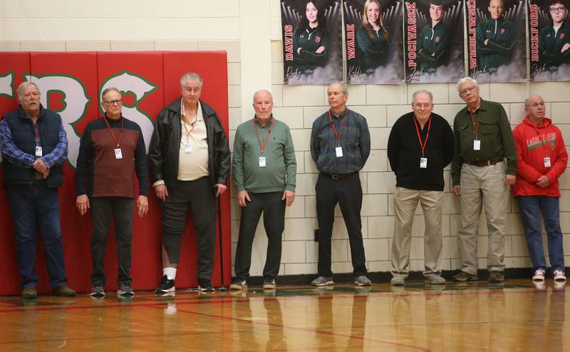 Members of the L-P 1967-1968 boys basketball team is introduced at halftime during the La Salle-Peru Township High School Hall of Honor ceremony on Friday, Feb. 7, 2025 in Sellett Gymnasium at L-P High School. Korsan was the head athletic trainer at L-P.