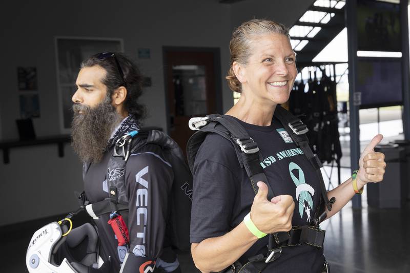 First time skydiver Dacia Barton gives a thumbs up to show she’s ready for the jump Friday, June 27, 2025.
