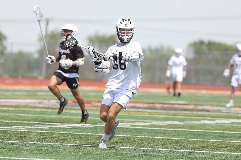 Lincoln-Way’s Nathan Uloswceh looks to pass against Oak Forest on Saturday, May 4, 2024 at Lincoln-Way West in New Lenox.