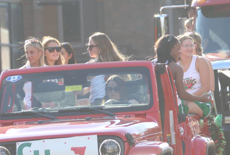 L-P cheerleaders ride on a float during the L-P homecoming parade on Thursday, Oct. 2, 2025 downtown Peru.