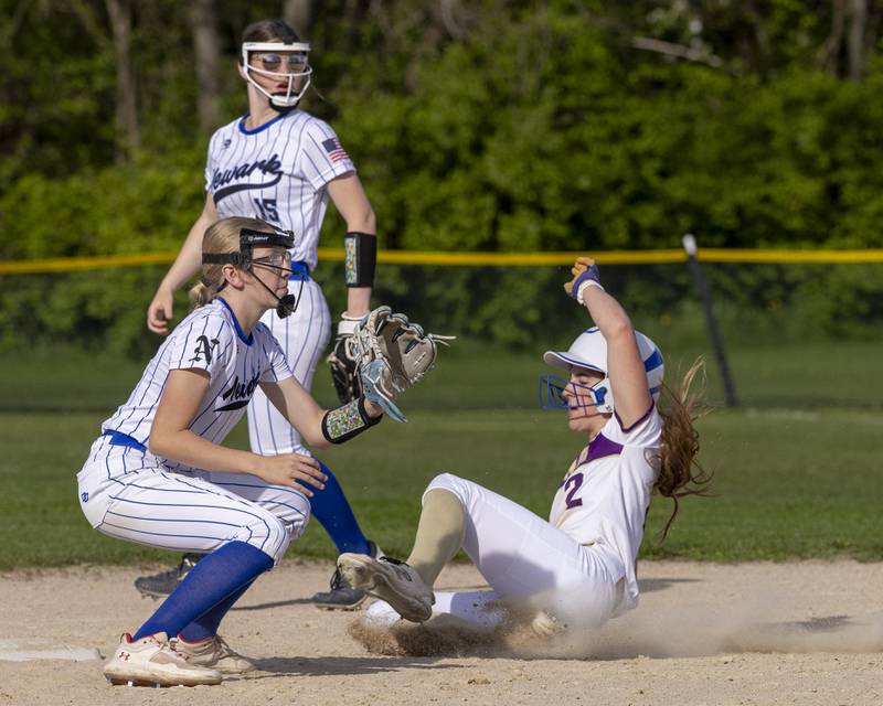 RayElle Brennan slides into second base for an attempted stolen base against Newark High School during the game on April 29, 2025 at Newark High School.