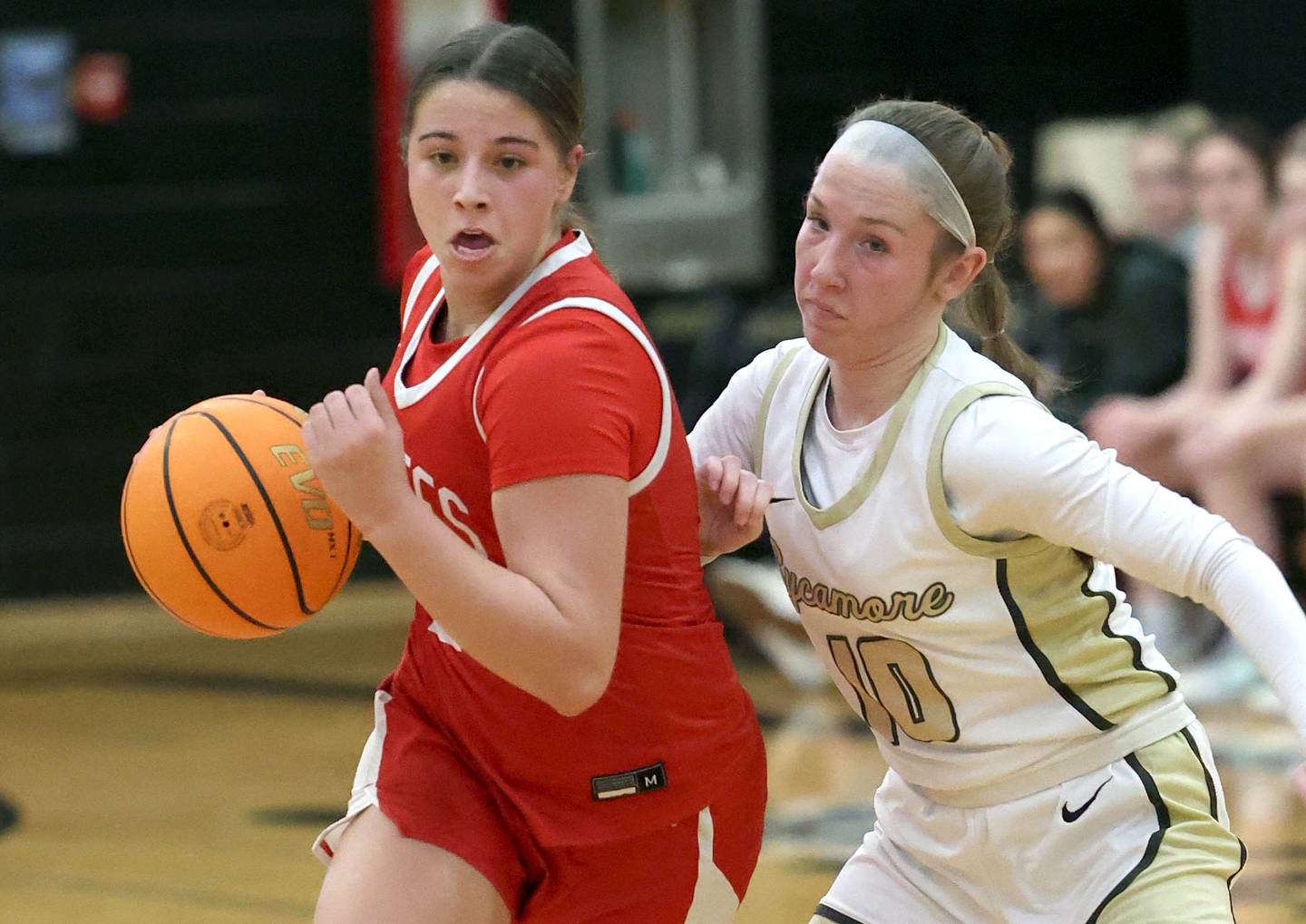 Ottawa's Marlie Orlandi gets by Sycamore's Cortni Kruizenga during their game Friday, Jan. 10, 2025, at Sycamore High School.