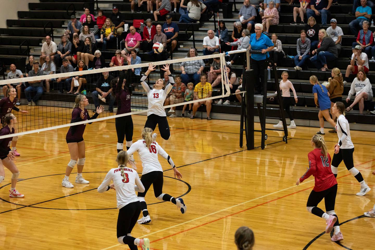 Erie-Prophetstown's Kennedy Buck (13) sets the ball in a 2023 match.